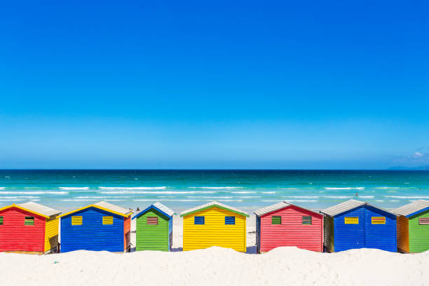 istock Colorful shacks in Muizenberg Beach 671231508