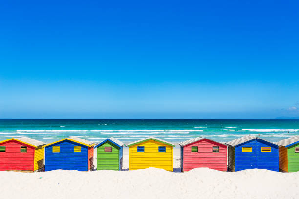 istock Colorful shacks in Muizenberg Beach 671232166