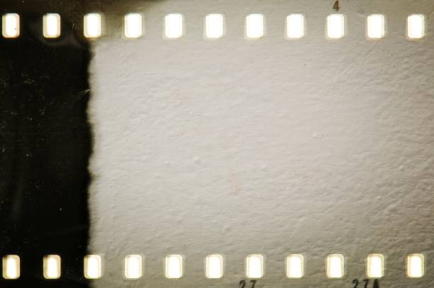 istock Vintage sepia film strip frame. Plaster textured. 671234868