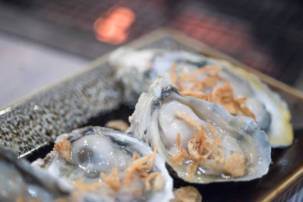 istock Close up of fresh Oysters on dish 671235452