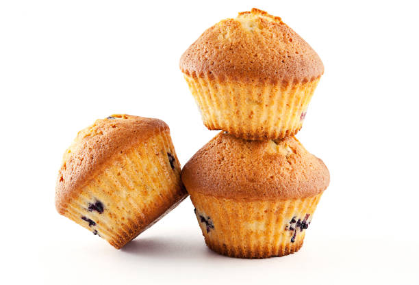 istock Tasty muffins isolated on white background 671247580