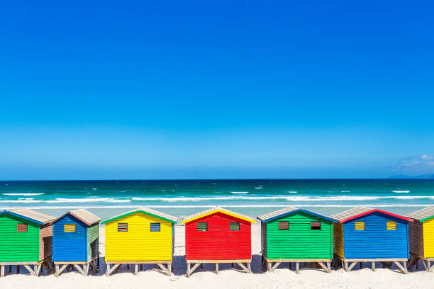 istock Colorful shacks in Muizenberg Beach 671253620