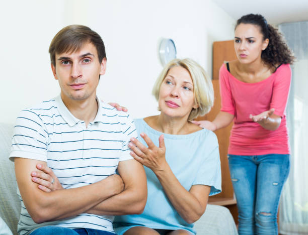 istock Family members trying to make it out with offended man 671259456