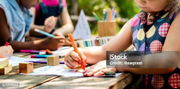 Group Of Kindergarten Kids Friends Drawing Art Class Outdoors Stock Photo - Download Image Now