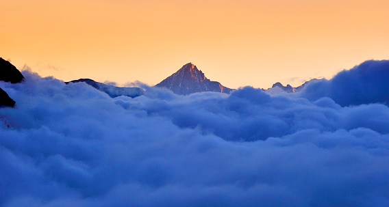 Matterhorn and Swiss Alps in the stratosphere fog at beauty sunrise.