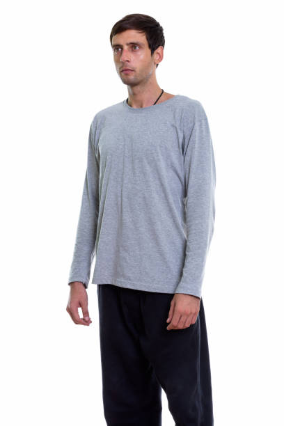istock Studio shot of young handsome man standing while thinking and looking up 671269684