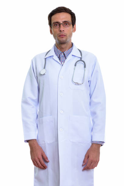 istock Studio shot of young handsome man doctor standing while wearing eyeglasses 671273326