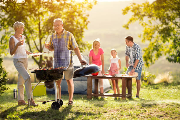 istock Happy generation family having a barbecue party 671277814