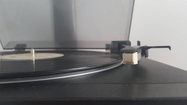 istock Vintage record player with vinyl disc 671278260