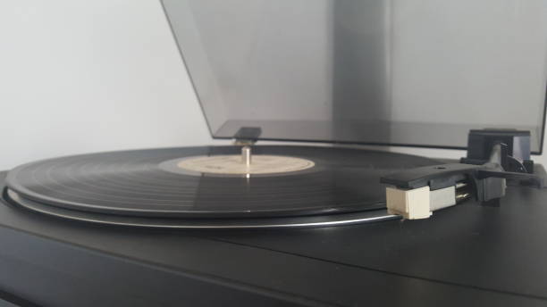 istock Vintage record player with vinyl disc 671278266