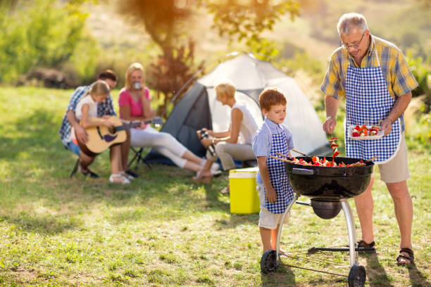 istock Generation family cooking on grill 671281286