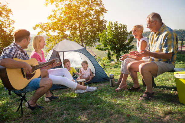 istock Family camping in the park 671281500