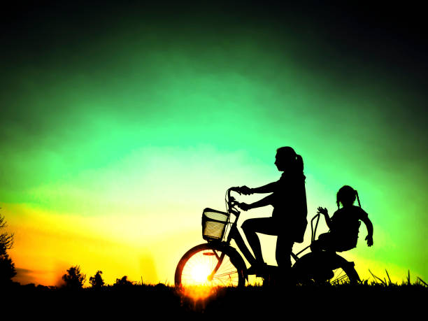istock Biker family silhouette father and daughter 671287540