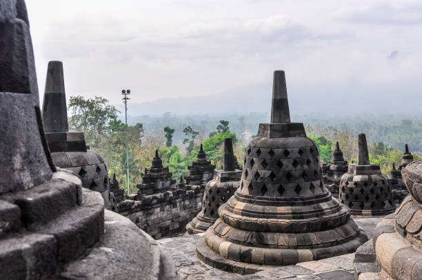 istock Buddhist stupas in Borobudur Temple, Indonesia 671288478