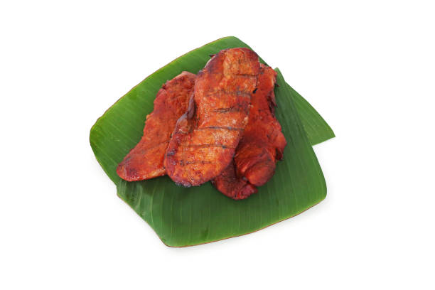 istock Roasted red pork three pieces on banana leaf 671291084