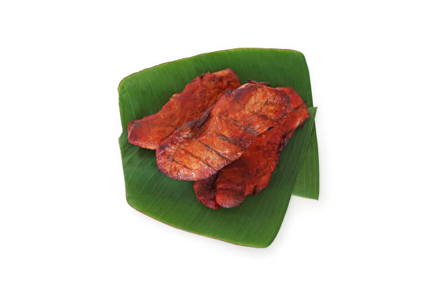 istock Roasted red pork three pieces on banana leaf 671291090