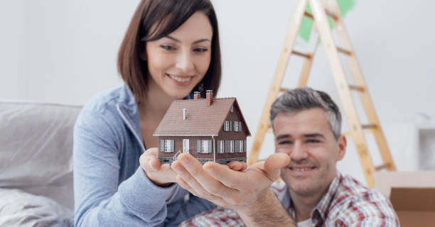 istock Couple building their house 671291768