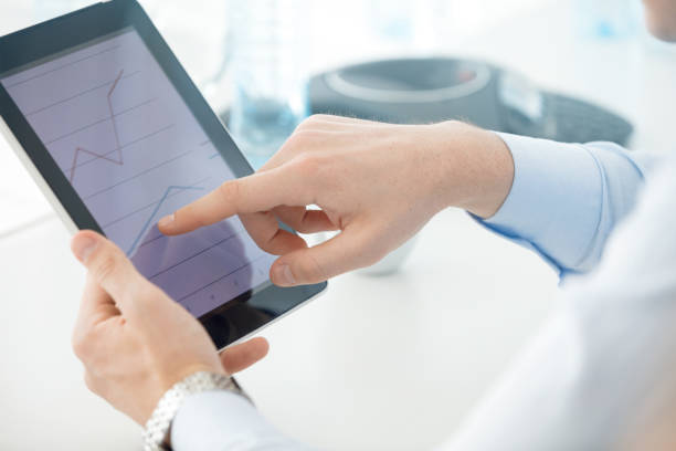 istock Businessman reviewing financial data 671294876