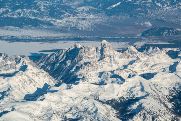 Grand Teton snow covered peaks stock photo