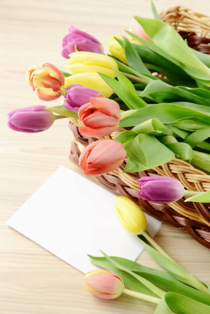 istock Springtime decoration with tulips and white paper copy space 671300074