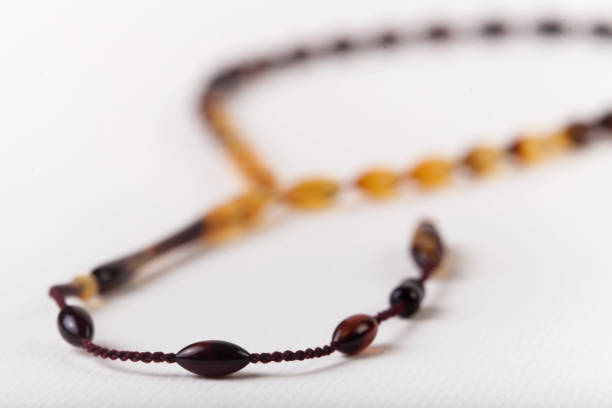 istock amber rosary close up 671308034