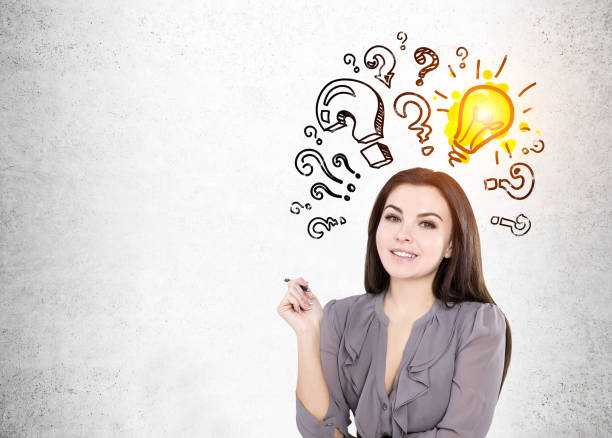 istock Woman in gray, questions and a bulb 671314062