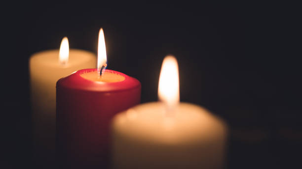 istock A lit candles on a table in a dining room 671316880