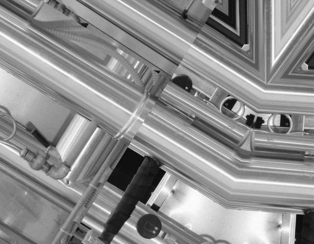 istock Black and white aluminum background. Metal pipes and abstract technological components. Industrial concept. 671318914