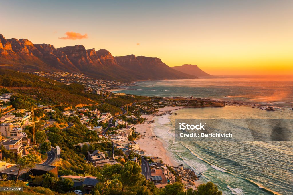 Clifton beach without people in the late afternoon A wide picture of Clifton Beach in Cape Town, South Africa at late afternoon in a beautiful sunset. Colorful and satured taken with a Canon 6D. South Africa Stock Photo