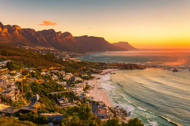 A wide picture of Clifton Beach in Cape Town, South Africa at late afternoon in a beautiful sunset. Colorful and satured taken with a Canon 6D.