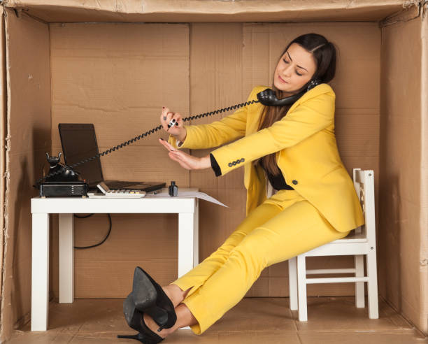 istock intern gossiping on the phone and deals with irrelevant things 671330980