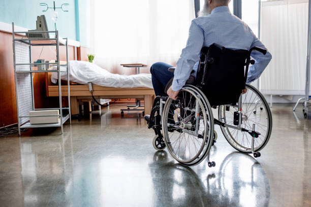 istock Senior patient in wheelchair 671334172