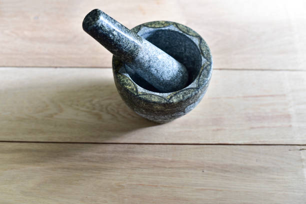 istock Stone mortar and pestle Thai equipment for cooking 671334686
