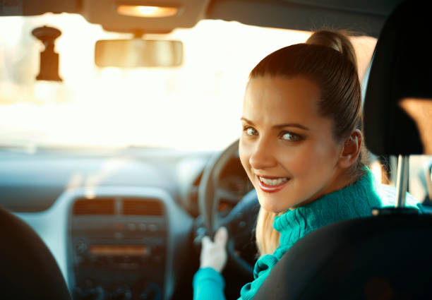 istock Evening drive - teenager at car 671334954