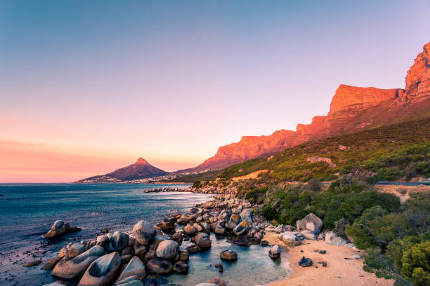Clifton beach without people in the late afternoon A wide picture of Clifton Beach in Cape Town, South Africa at late afternoon in a beautiful sunset. Colorful and satured taken with a Canon 6D. clifton stock pictures, royalty-free photos & images