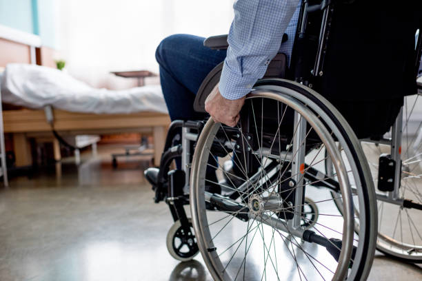 istock Senior patient in wheelchair 671338562
