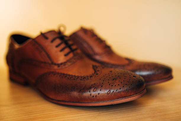 istock Men's black shoes on the floor 671340070