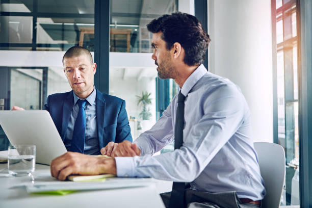 istock Looking at the pros and cons of their plans 671353070