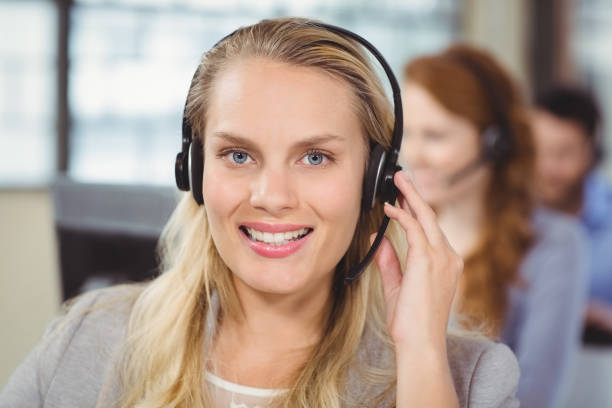 istock Portrait of cheerful operator 671356992
