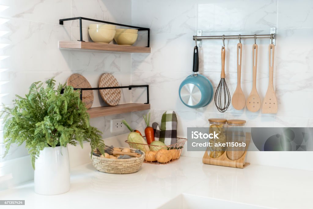 Kitchen Wood Chef Accessories Hanging Copper Kitchen White Wall Stock Photo - Download Image - iStock