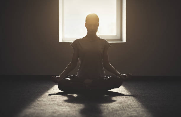 istock Girl meditating during a yoga practice. 671361286