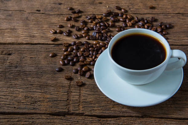 istock coffee cup on the old wooden floor 671361872