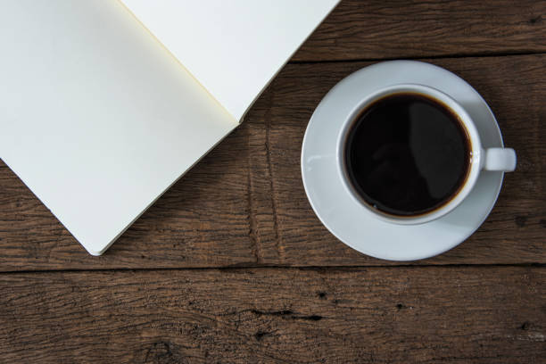 istock coffee cup on the old wooden floor 671362204