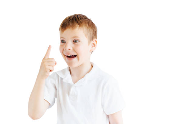 istock Little boy stand on white background and show his emotions 671371612