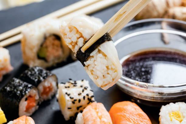 istock Slate tray of assorted sushi 671371686
