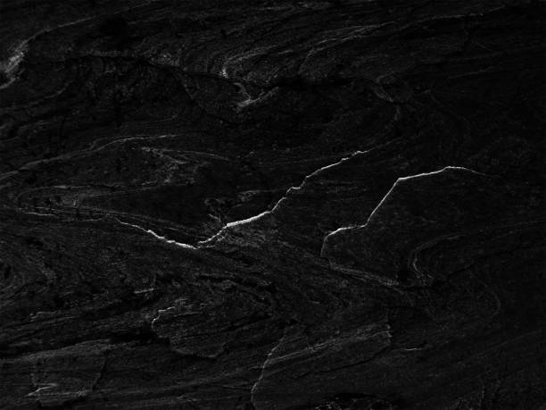 istock Black stone pattern texture background, Detailed of real genuine stone from nature. 671375526