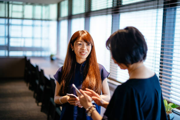 istock Brainstoming during coffee break in Japanese corporation 671382566