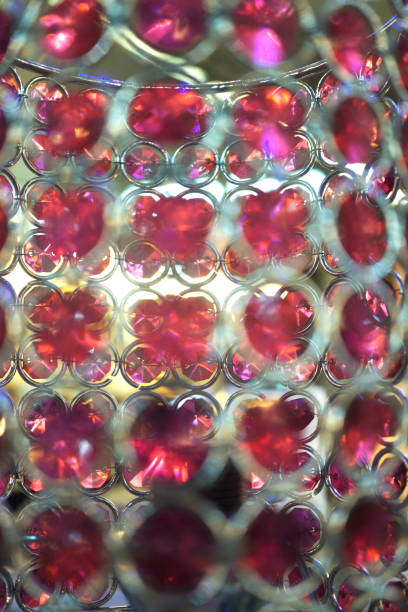 istock Chandelier Crystals in pink color 671389536