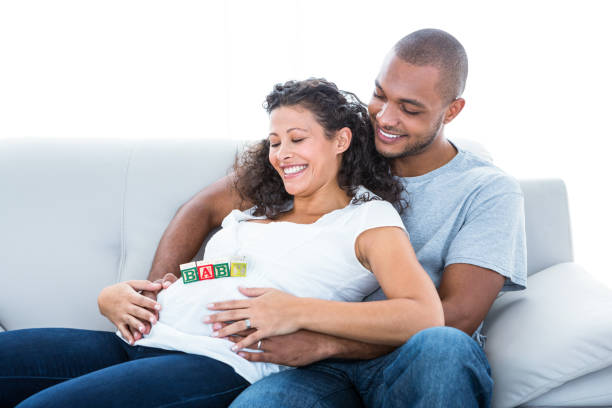 istock Cheerful couple enjoying at home 671393916