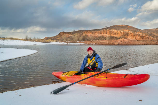 istock winter kayaking in northern Colorado 671402970